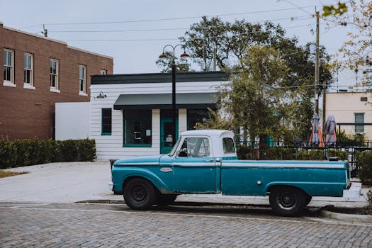 a classic Ford truck at a car show